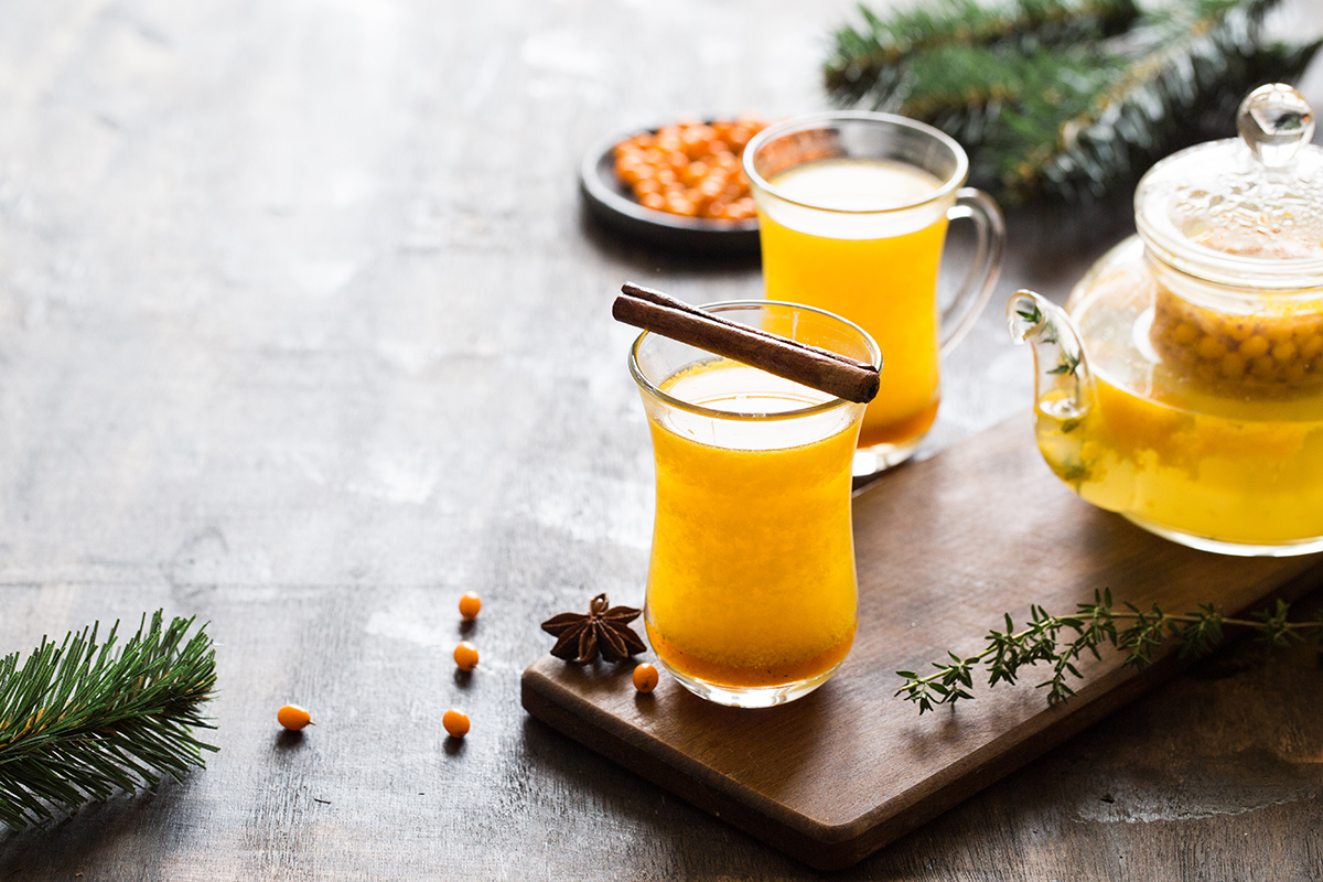 Autumn or winter sea buckthorn drink. Sea Buckthorn tea, selecti